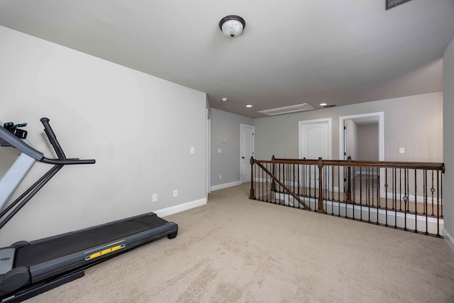 exercise room featuring recessed lighting, baseboards, and carpet floors