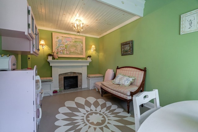 sitting room featuring a fireplace, an inviting chandelier, ornamental molding, and wood ceiling