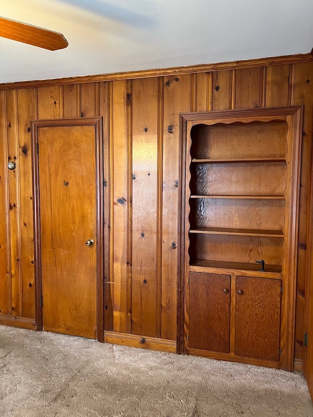 4332 Fay Dr, Columbus, GA 31907 - carpeted empty room featuring ceiling fan and wooden walls