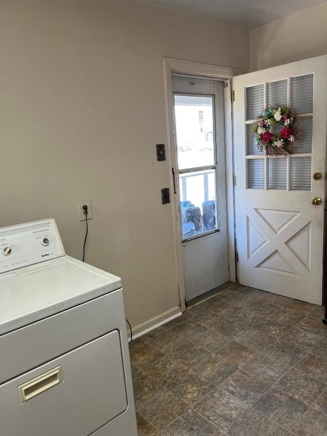 4332 Fay Dr, Columbus, GA 31907 - laundry area with washer / clothes dryer, cabinet space, stone finish flooring, and baseboards