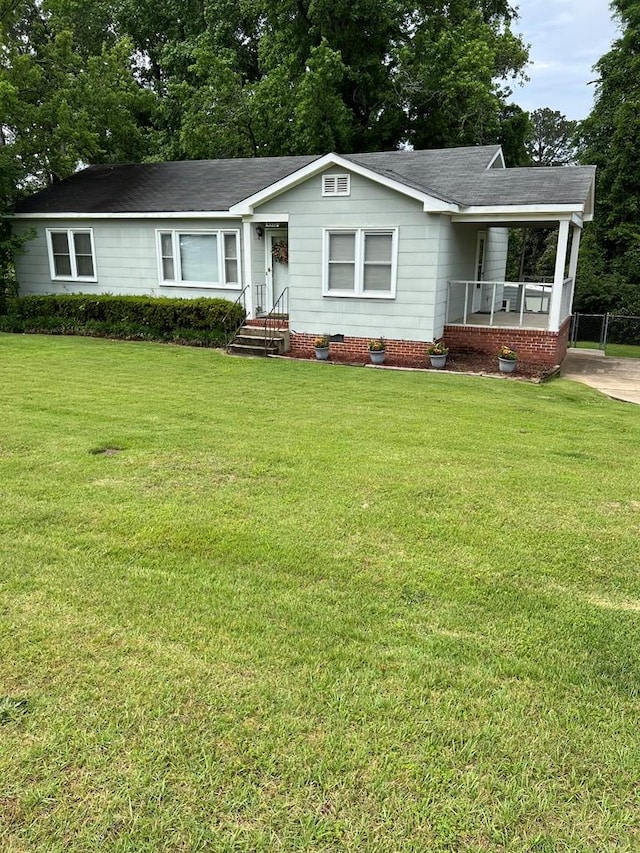 4332 Fay Dr, Columbus, GA 31907 - back of property with central AC unit, a lawn, and crawl space