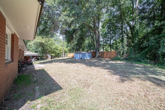 view of yard featuring fence