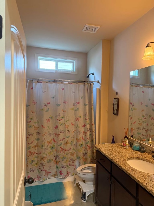 7613 Mockernut Way, Midland, GA 31820 - full bathroom with toilet, tile patterned flooring, vanity, and shower / bathtub combination with curtain