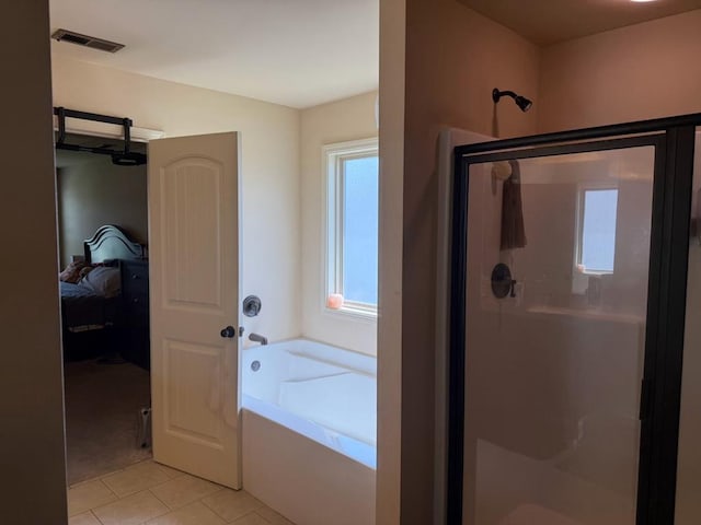 7613 Mockernut Way, Midland, GA 31820 - full bathroom with ensuite bath, a shower stall, a bath, and tile patterned floors