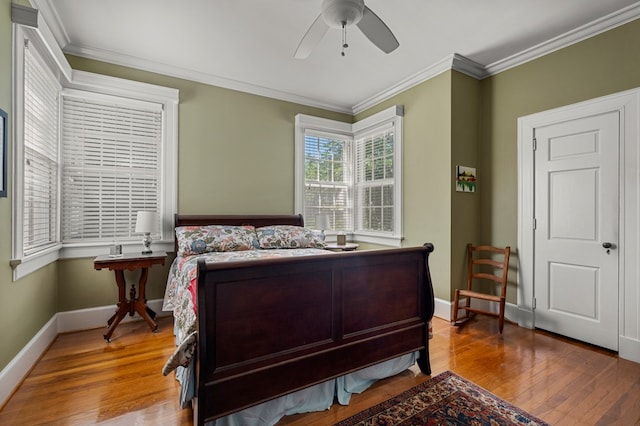 1809 Carter Ave, Columbus, GA 31906 - bedroom with wood finished floors, ornamental molding, and ceiling fan