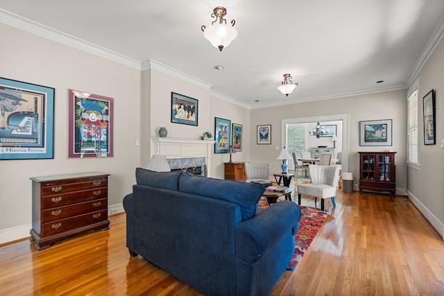 1809 Carter Ave, Columbus, GA 31906 - living room featuring light wood finished floors, healthy amount of natural light, a high end fireplace, and crown molding