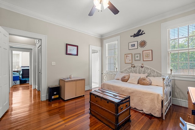 1809 Carter Ave, Columbus, GA 31906 - bedroom with dark wood finished floors, crown molding, and a ceiling fan