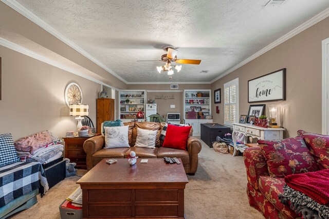 3601 Nutmeg Dr, Columbus, GA 31909 - carpeted living room with a ceiling fan, ornamental molding, and built in features