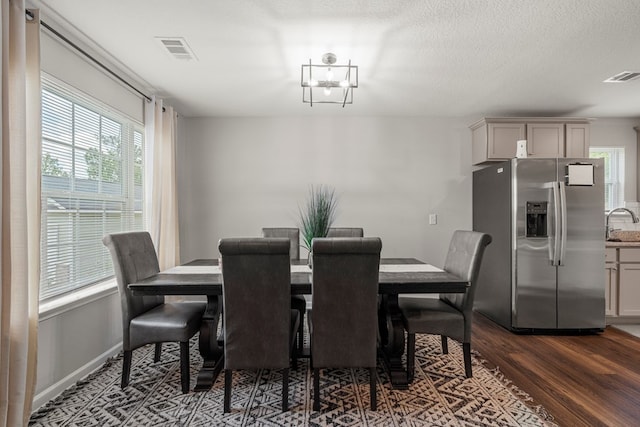 6368 Sandy Bottom Dr, Columbus, GA 31907 - dining area featuring dark wood finished floors and baseboards