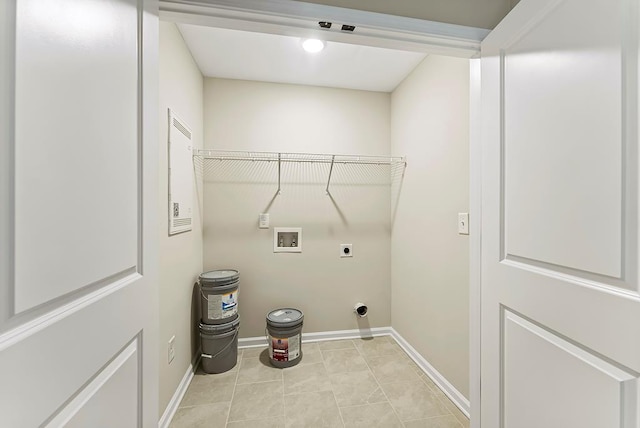 laundry area with washer hookup, light tile patterned floors, and electric dryer hookup