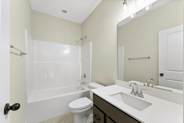 full bathroom featuring tile patterned floors, vanity, bathing tub / shower combination, and toilet