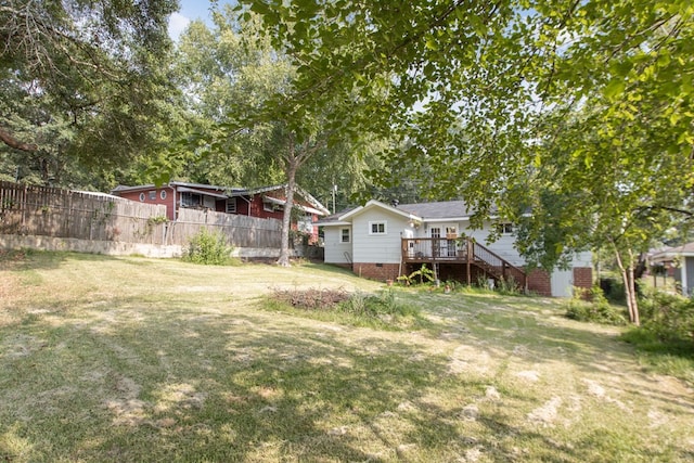 view of yard featuring a deck