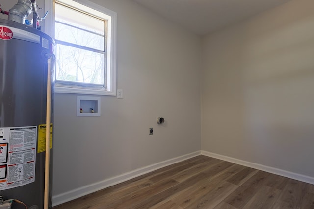 washroom with laundry area, hookup for a washing machine, water heater, wood finished floors, and hookup for an electric dryer