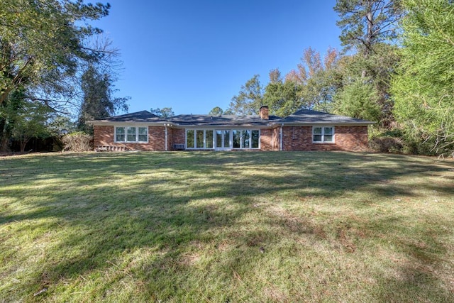 view of front of house with a front lawn