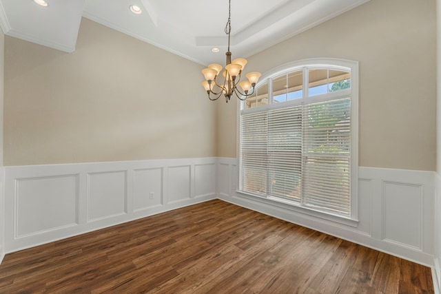 1032 Red Maple Way, Columbus, GA 31904 - spare room featuring a chandelier, crown molding, dark wood finished floors, a wainscoted wall, and a decorative wall