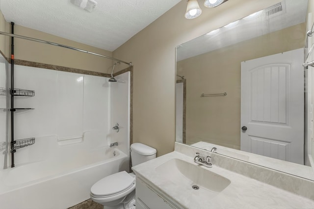1032 Red Maple Way, Columbus, GA 31904 - full bathroom featuring toilet, vanity,  shower combination, and a textured ceiling