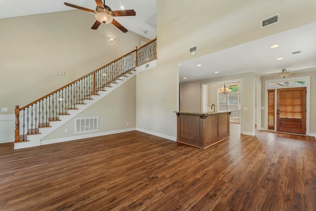 1032 Red Maple Way, Columbus, GA 31904 - unfurnished living room with stairway, dark wood-type flooring, a ceiling fan, baseboards, and recessed lighting