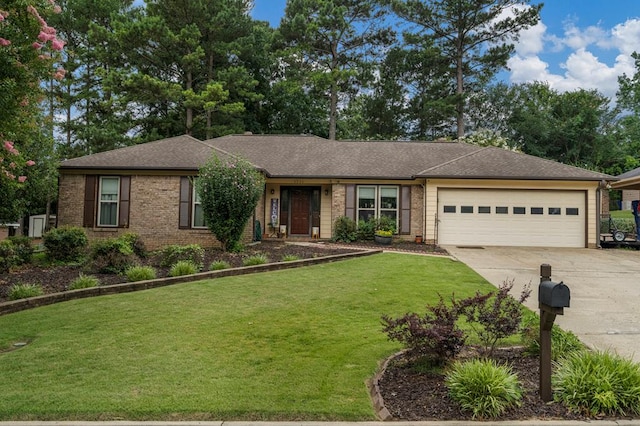 5936 Manassas Dr, Columbus, GA 31909 - view of front of property with brick siding, concrete driveway, an attached garage, a front yard, and a shingled roof