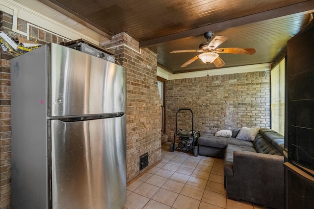 5936 Manassas Dr, Columbus, GA 31909 - living room with brick wall, light tile patterned floors, a ceiling fan, and a wooden ceiling with exposed beams