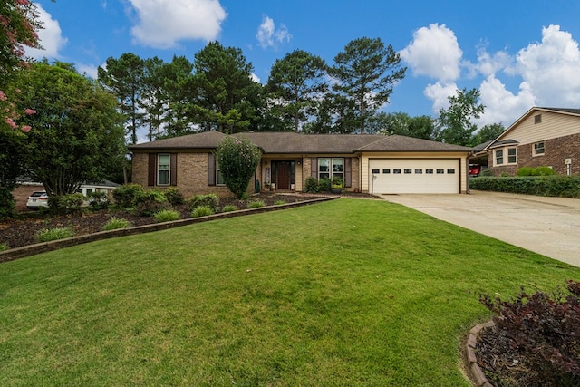 5936 Manassas Dr, Columbus, GA 31909 - ranch-style home with a garage, concrete driveway, a front yard, and brick siding