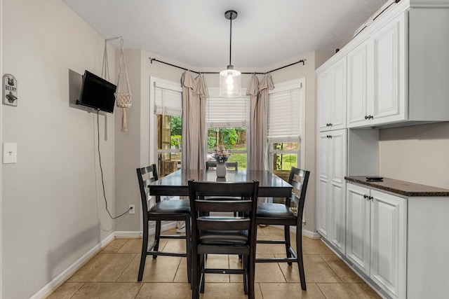 5936 Manassas Dr, Columbus, GA 31909 - dining room featuring baseboards and light tile patterned floors