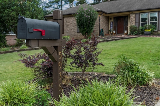 5936 Manassas Dr, Columbus, GA 31909 - exterior view of a downspout, gutters, and roof with shingles