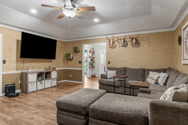 5936 Manassas Dr, Columbus, GA 31909 - living area featuring a tray ceiling, light wood finished floors, a ceiling fan, wallpapered walls, and recessed lighting