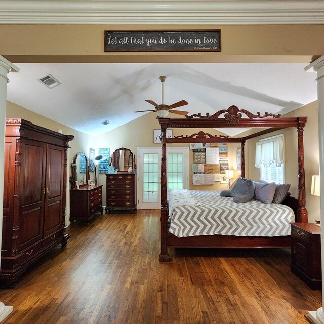 bedroom with ceiling fan, dark hardwood / wood-style flooring, crown molding, and vaulted ceiling