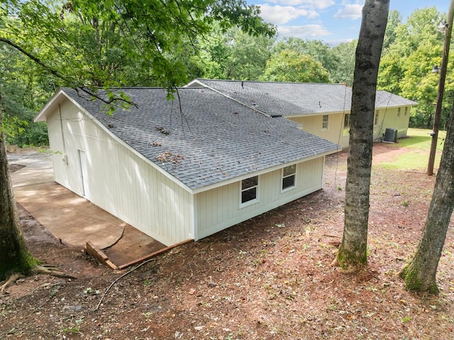 view of home's exterior with central AC