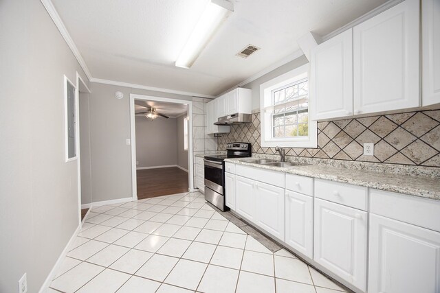 646 Byrd Ave, Smiths Station, AL 36877 - kitchen featuring light tile patterned floors, stainless steel electric stove, visible vents, under cabinet range hood, and a sink