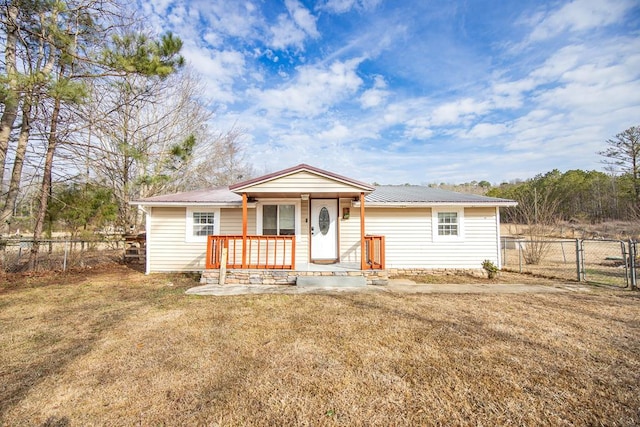 646 Byrd Ave, Smiths Station, AL 36877 - view of front of home featuring a gate, fence, and metal roof
