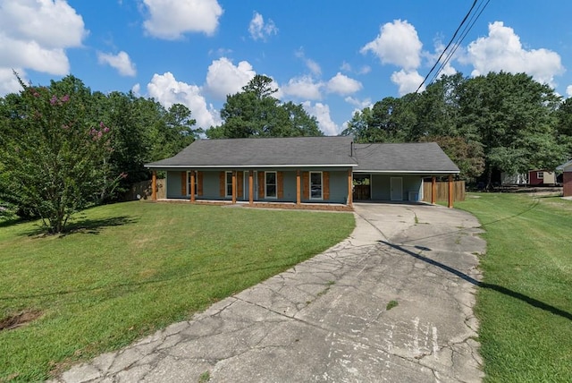 766 Lee Road 0553, Phenix City, AL 36870 - ranch-style house featuring driveway, a porch, a front yard, and an attached carport