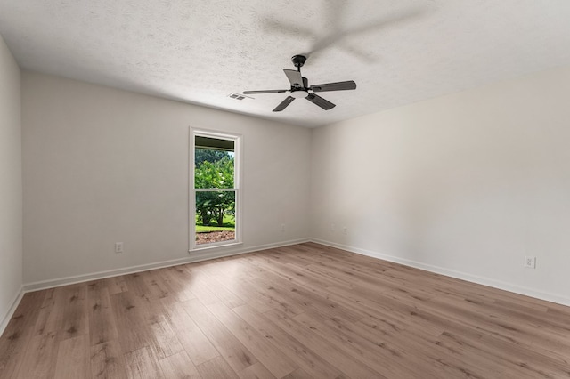 766 Lee Road 0553, Phenix City, AL 36870 - unfurnished room featuring light wood-type flooring, ceiling fan, and a textured ceiling