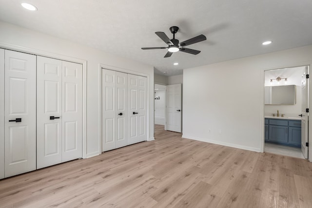 766 Lee Road 0553, Phenix City, AL 36870 - unfurnished bedroom with two closets, light wood finished floors, ensuite bath, recessed lighting, and ceiling fan
