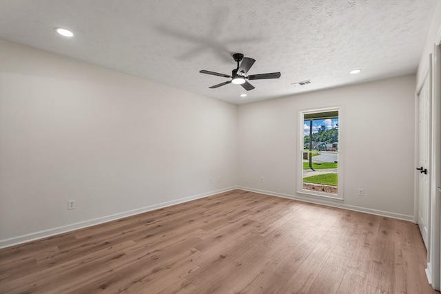 766 Lee Road 0553, Phenix City, AL 36870 - empty room with light wood finished floors, a ceiling fan, recessed lighting, and a textured ceiling