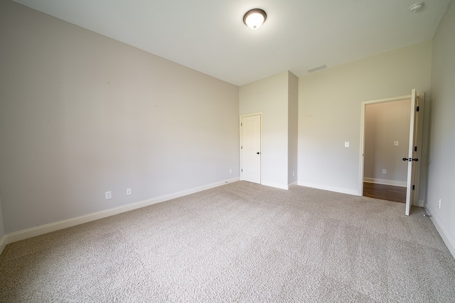 spare room with carpet flooring