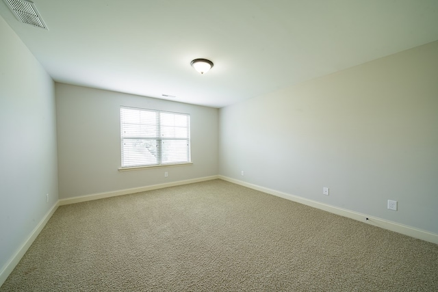 spare room with carpet flooring