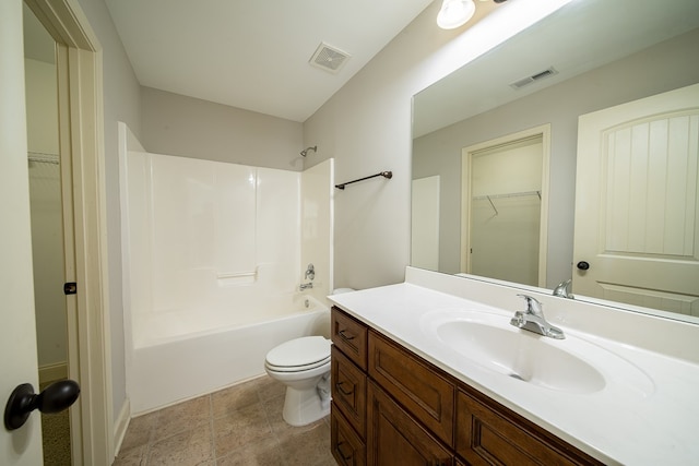 full bathroom featuring vanity, shower / bath combination, and toilet