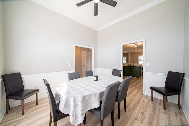 5082 Aaron Ln, Columbus, GA 31907 - dining space featuring ornamental molding, light wood-style flooring, and a ceiling fan