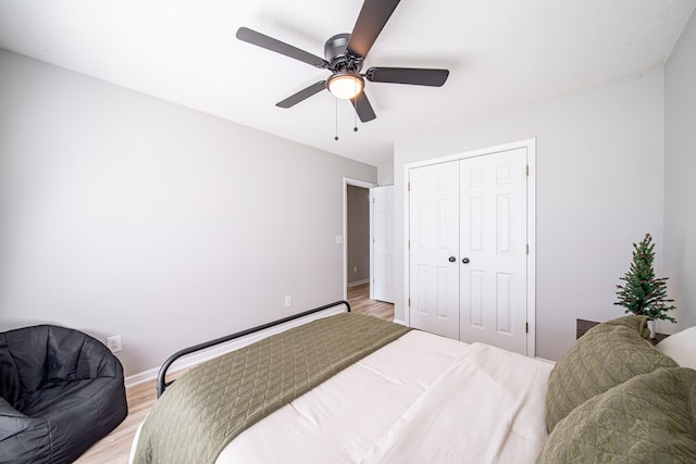 5082 Aaron Ln, Columbus, GA 31907 - bedroom featuring light wood-style flooring, a closet, and a ceiling fan