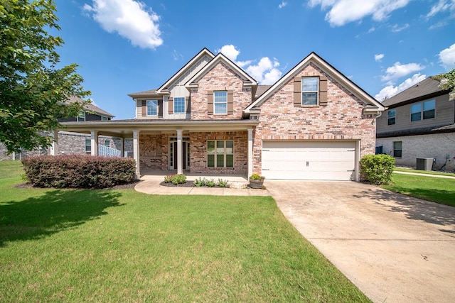 235 Pebblebrook Ln, Columbus, GA 31904 - view of front facade featuring a garage, brick siding, a front yard, concrete driveway, and covered porch