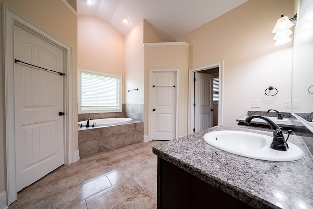 235 Pebblebrook Ln, Columbus, GA 31904 - bathroom featuring vanity, a bath, vaulted ceiling, and tile patterned flooring