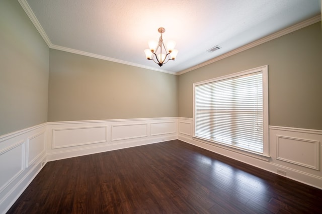 235 Pebblebrook Ln, Columbus, GA 31904 - unfurnished room with a chandelier, a wainscoted wall, ornamental molding, dark wood-style flooring, and a decorative wall