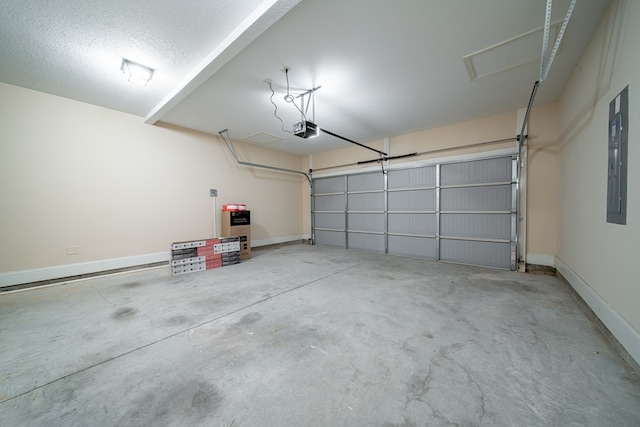 235 Pebblebrook Ln, Columbus, GA 31904 - garage featuring a garage door opener and electric panel