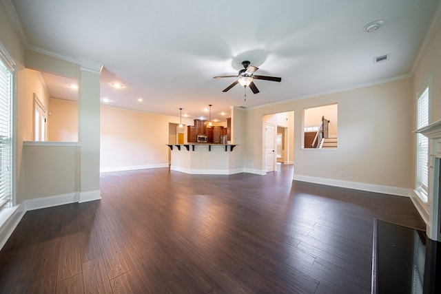 235 Pebblebrook Ln, Columbus, GA 31904 - unfurnished living room with a ceiling fan, crown molding, dark wood-style floors, recessed lighting, and a fireplace
