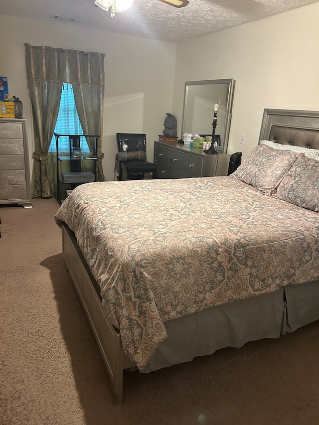 5027 Abbott Ave, Columbus, GA 31904 - bedroom with carpet flooring and a textured ceiling