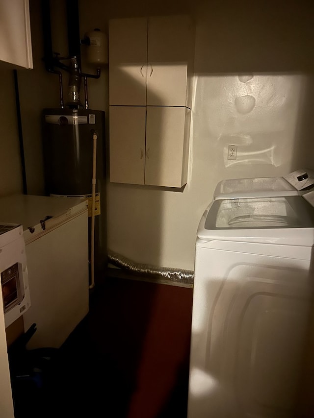 5027 Abbott Ave, Columbus, GA 31904 - laundry room featuring gas water heater and washing machine and clothes dryer