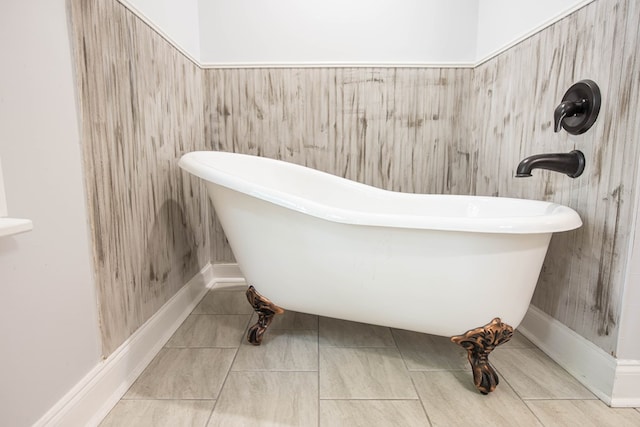 170 Slappy Dr, Hamilton, GA 31811 - bathroom with a freestanding tub and tile patterned flooring