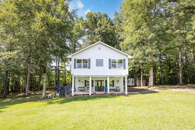 170 Slappy Dr, Hamilton, GA 31811 - view of front of home featuring a porch, a front yard, and a storage shed
