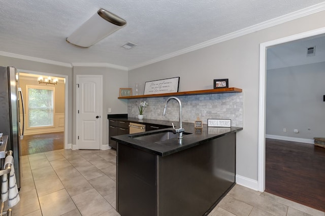 142 Richardson Ct, Fortson, GA 31808 - kitchen featuring a sink, open shelves, a peninsula, a chandelier, and ornamental molding